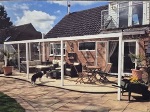 Rear Elevation- vendor photo- click for photo gallery
